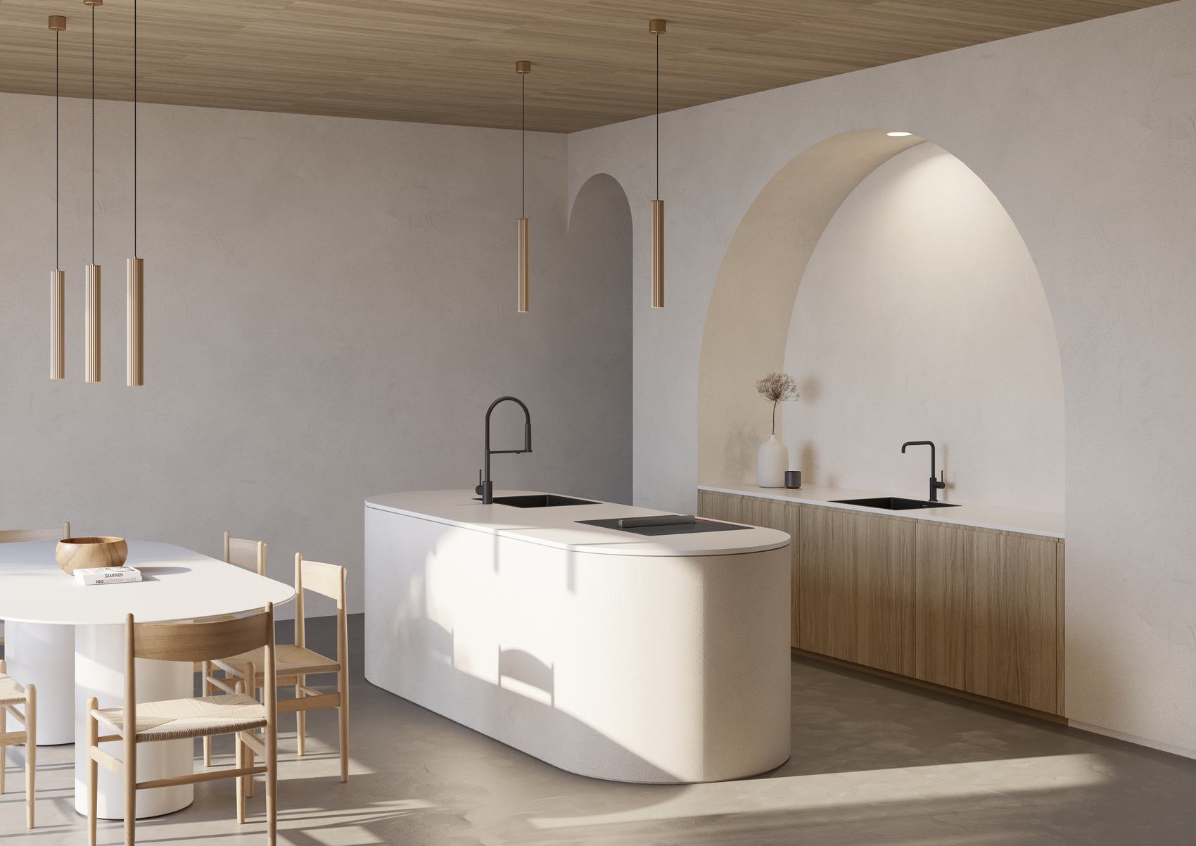 Cucina con isola curva bianca, lampade a sospensione in legno e nicchia ad arco
