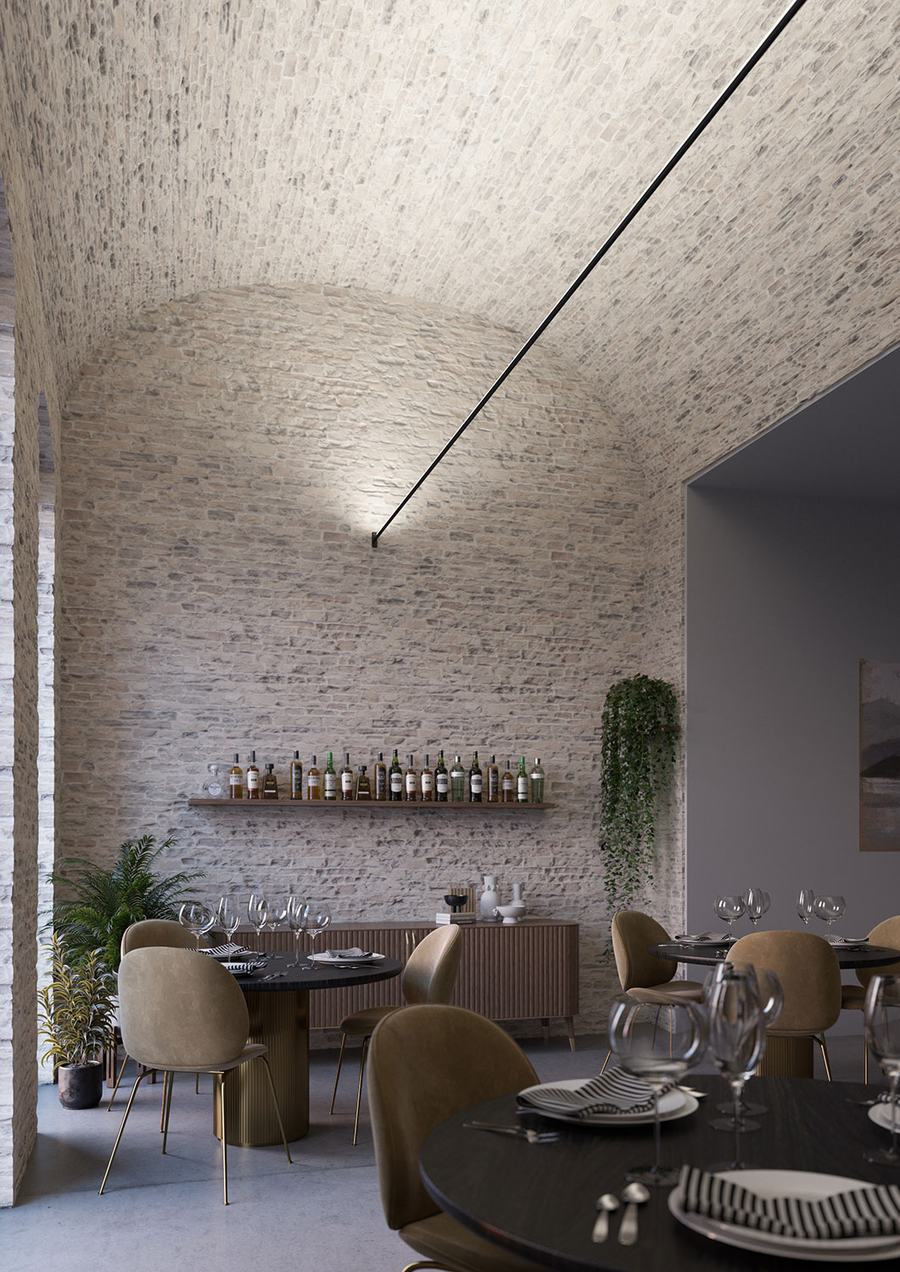 Ristorante con soffitto a volta in mattoni, tavoli neri e sedie color senape
